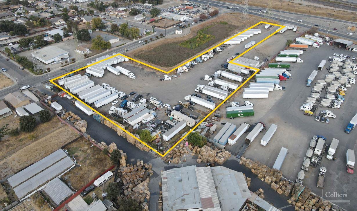 Industrial yard with trailers and trucks